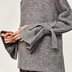 Zara Grey Woolen Sweater with Tie Sleeves.